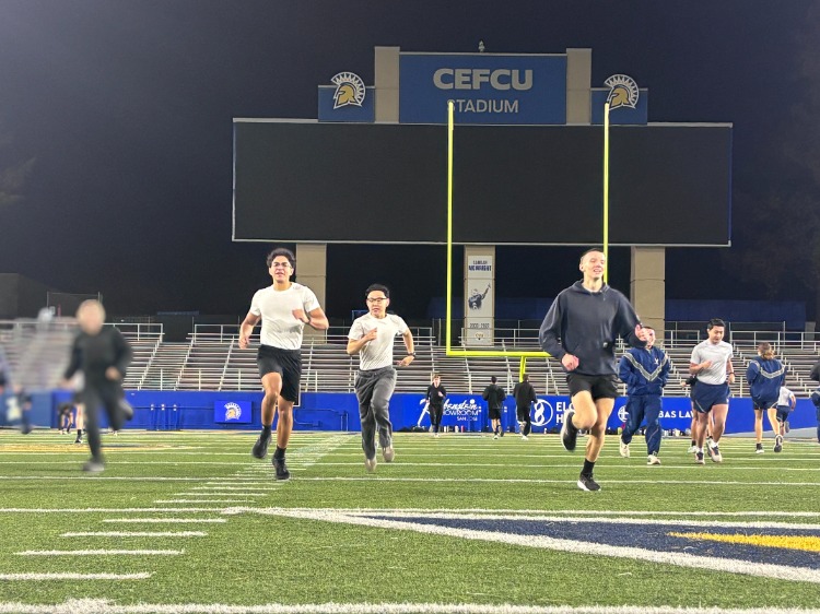 Cadets conducting PT at CEFCU Stadium