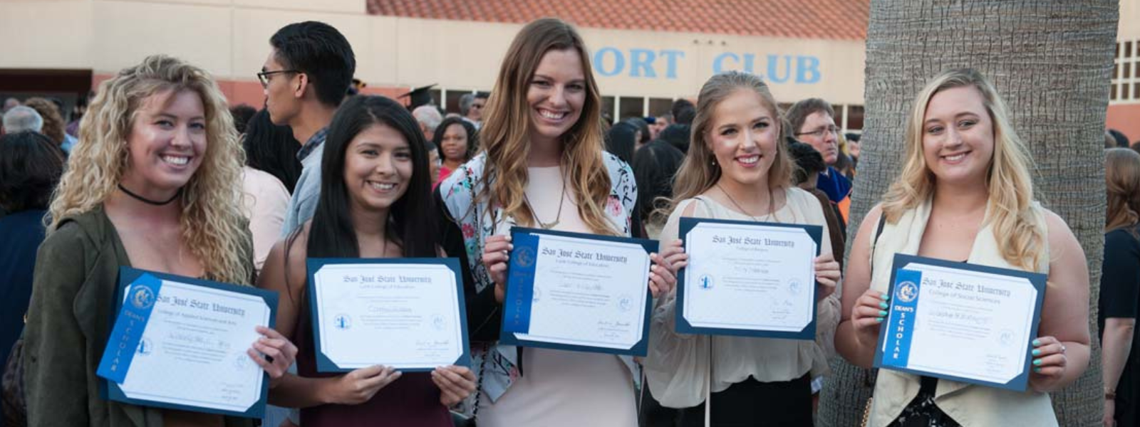 SJSU students holding certificates