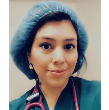 Silvie Arabia in scrubs.